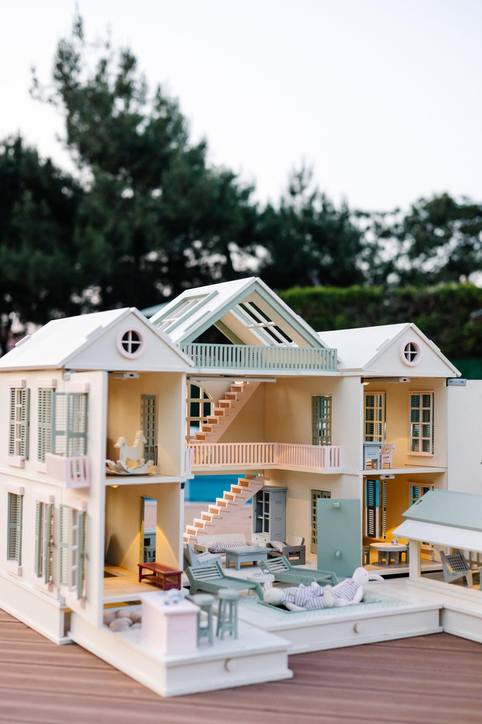 Luxury Wooden Dollhouse with Handcrafted Miniatures – Little Forest Animals Handcrafted wooden dollhouse with miniature furniture and details, displayed in a minimal setting.
