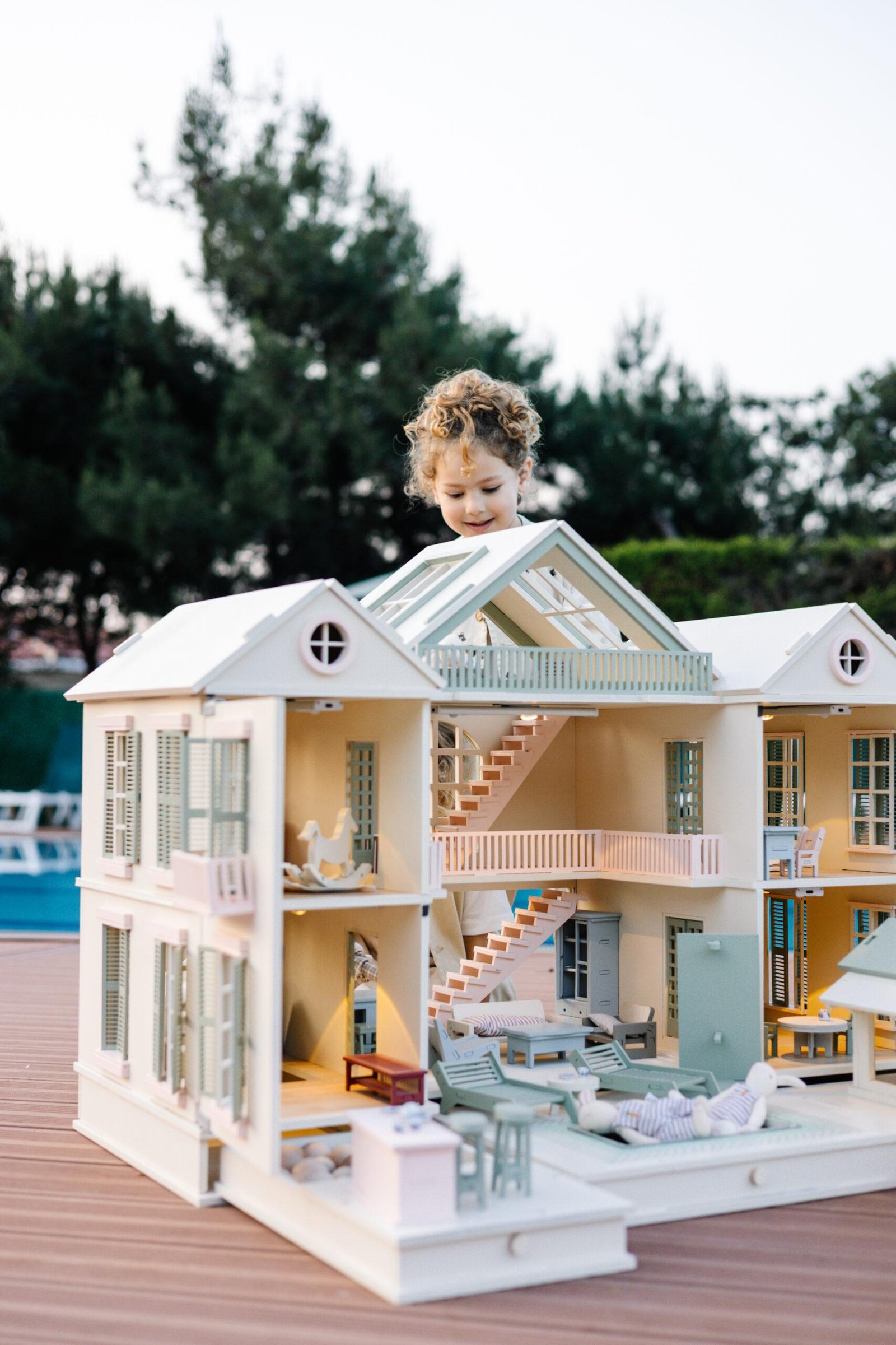 Luxury Wooden Dollhouse with Handcrafted Miniatures – Little Forest Animals Handcrafted wooden dollhouse with miniature furniture and details, displayed in a minimal setting.