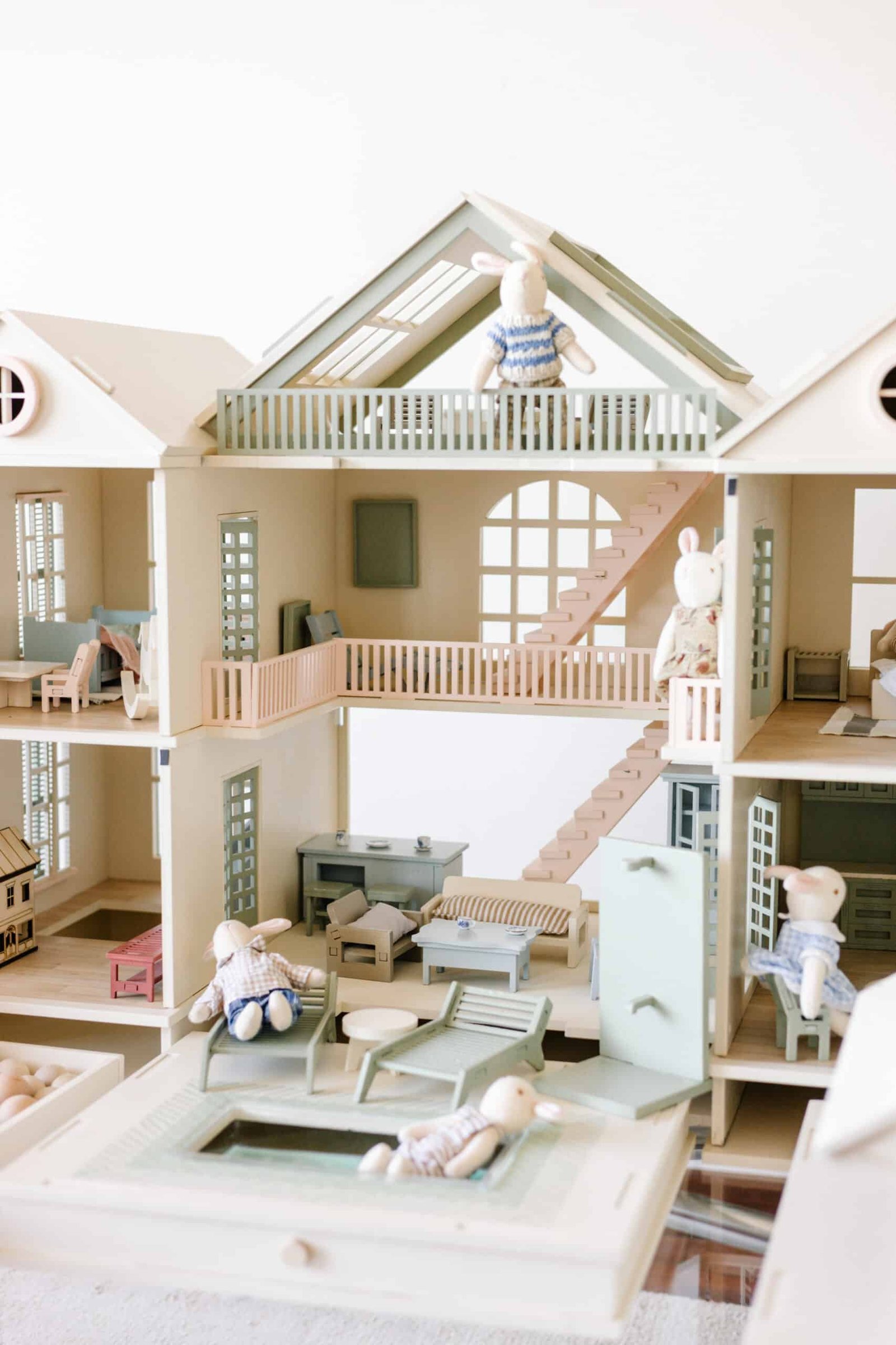 Luxury Wooden Dollhouse with Handcrafted Miniatures – Little Forest Animals Handcrafted wooden dollhouse with miniature furniture and details, displayed in a minimal setting.