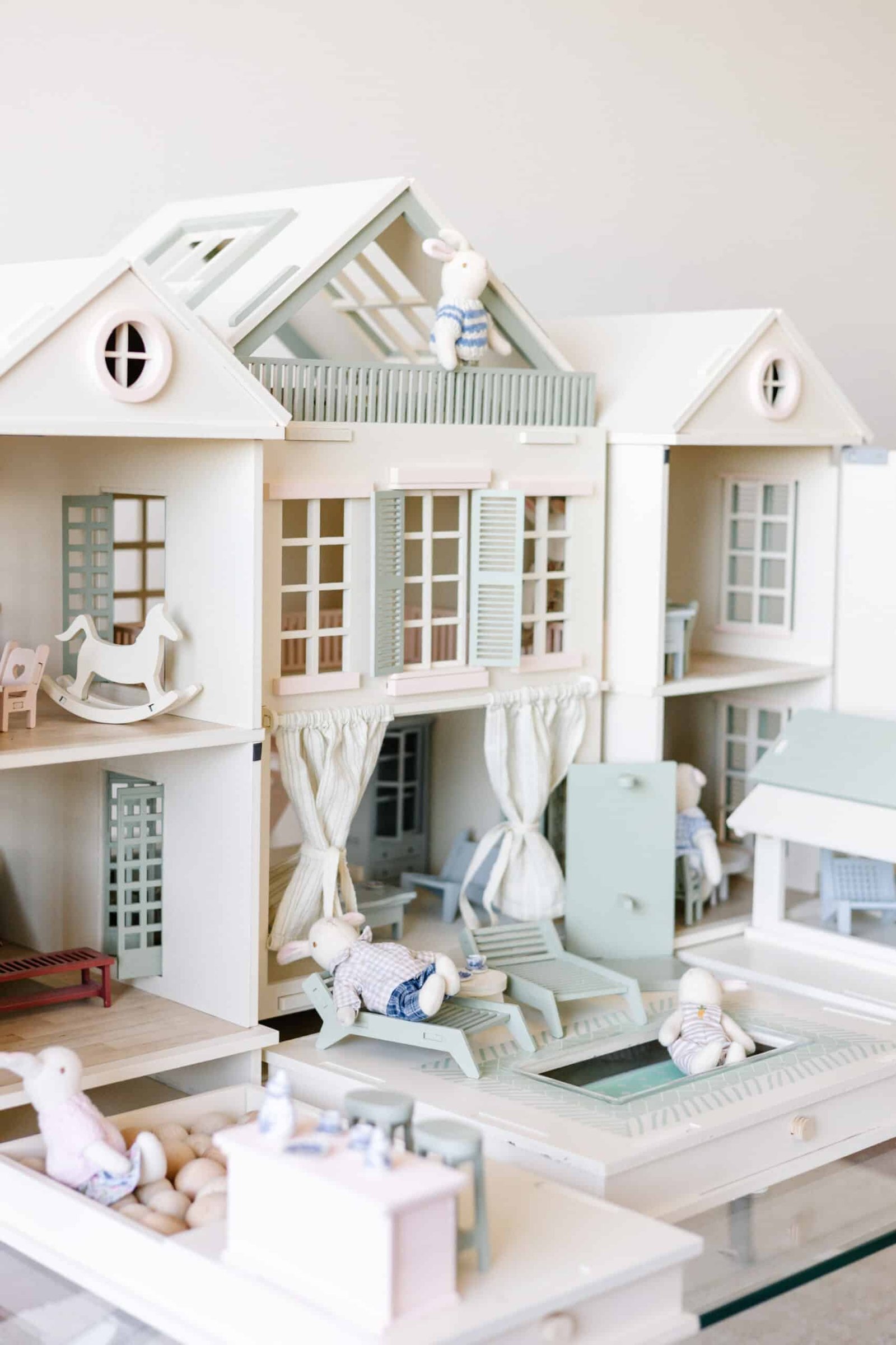 Luxury Wooden Dollhouse with Handcrafted Miniatures – Little Forest Animals Handcrafted wooden dollhouse with miniature furniture and details, displayed in a minimal setting.
