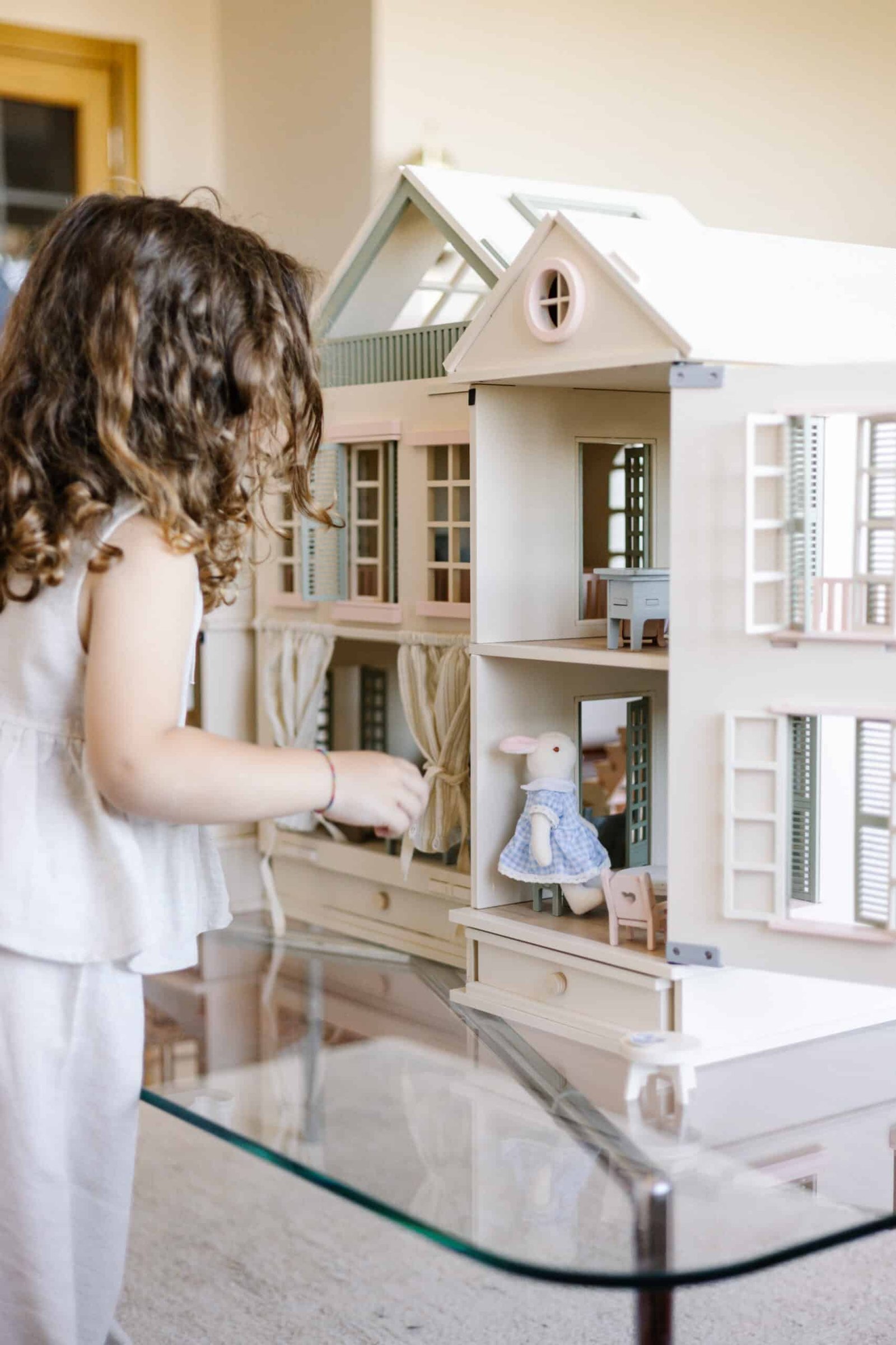Luxury Wooden Dollhouse with Handcrafted Miniatures – Little Forest Animals Handcrafted wooden dollhouse with miniature furniture and details, displayed in a minimal setting.