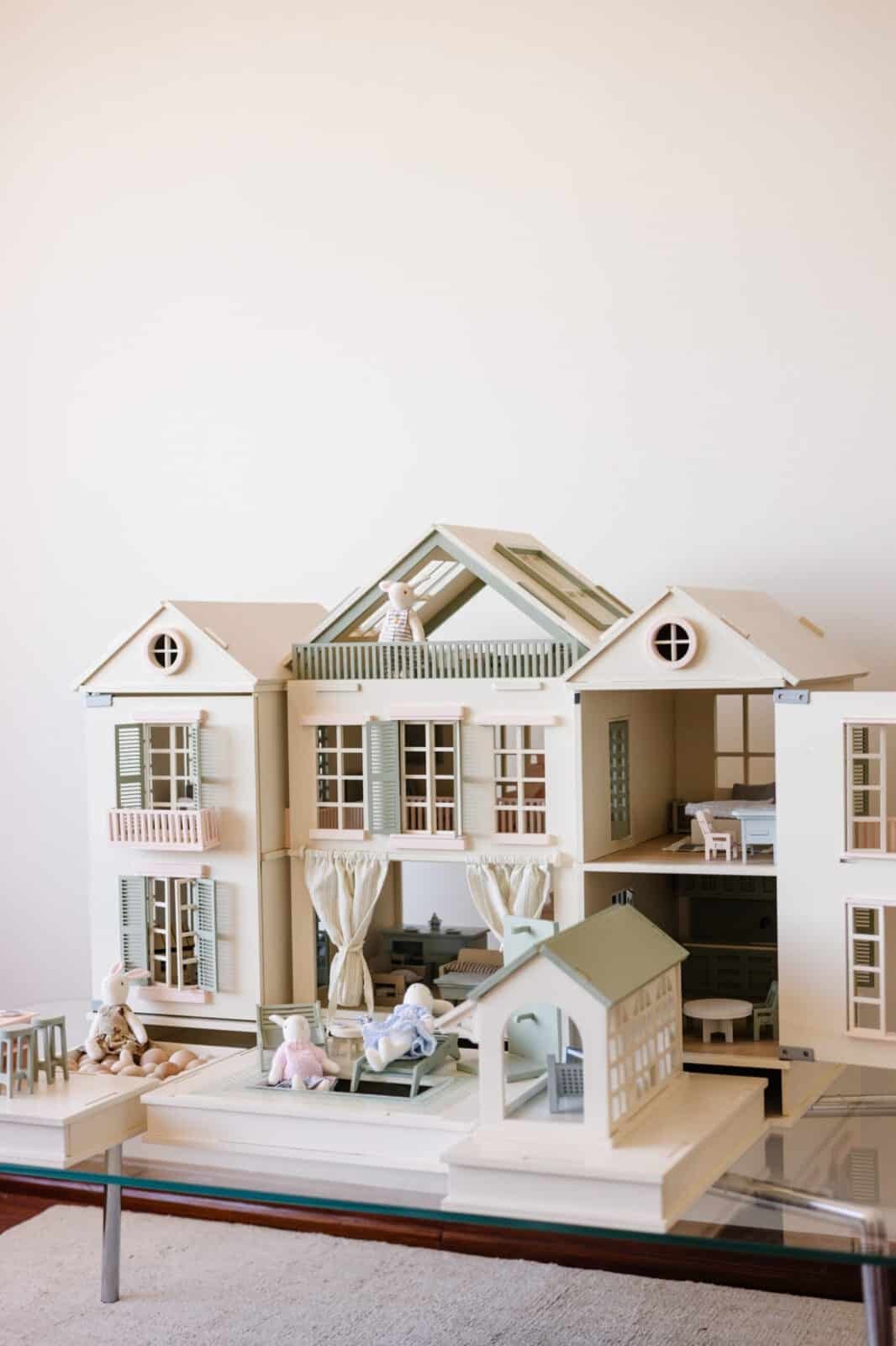 Luxury Wooden Dollhouse with Handcrafted Miniatures – Little Forest Animals Handcrafted wooden dollhouse with miniature furniture and details, displayed in a minimal setting.